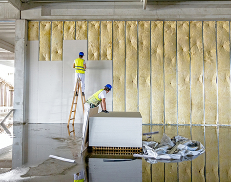 Gypsum partition by Zau Interiors, used to create separate spaces in an office