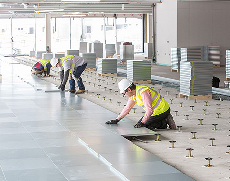 Zau Interiors false flooring, a stylish and functional way to add character to an office floor