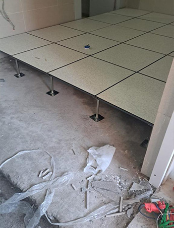 Raised access floor by Zau Interiors, used to improve the airflow and accessibility of an office